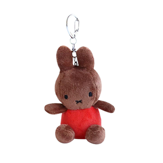 Melanie Sitting Orange Backpack Keychain